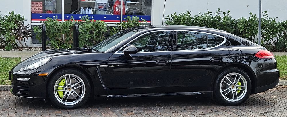 Black Porsche Panamera with glossy paint detail